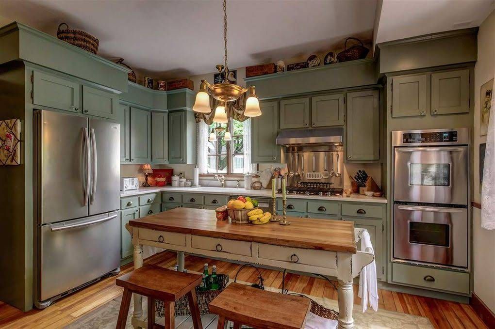 farmhouse kitchen with green wall